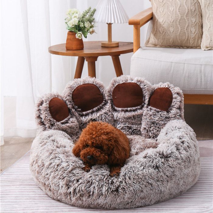 Cozy Zenvra bear paw pet bed with soft plush interior, perfect for small dogs and cats to rest comfortably.