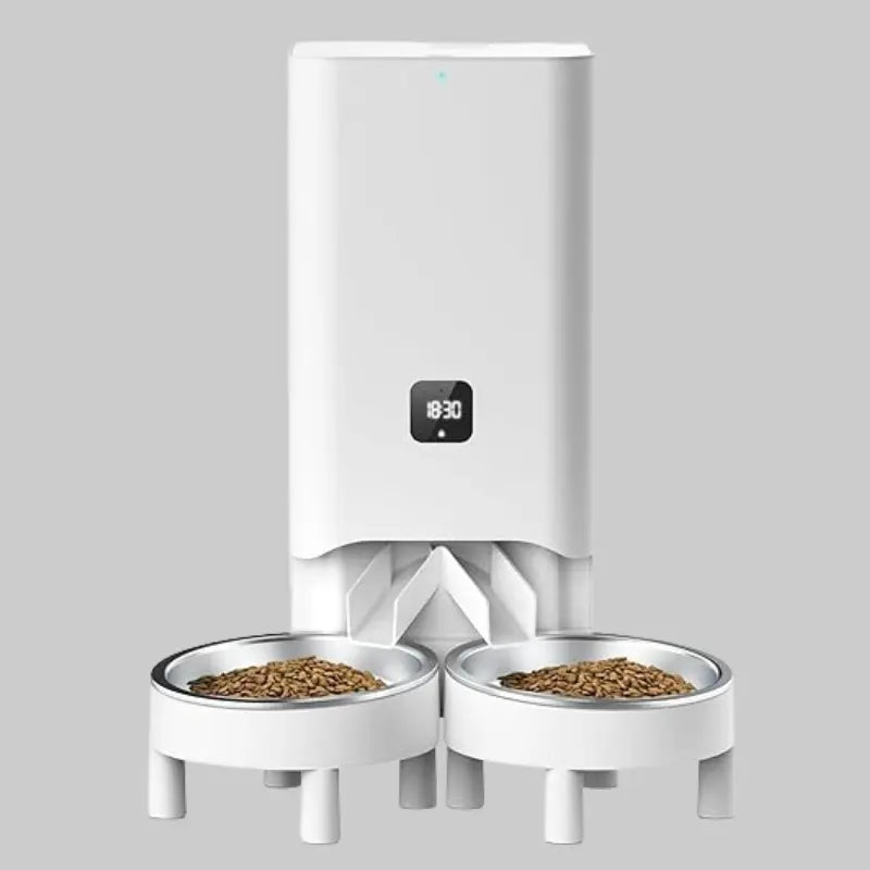 Zenvra smart automatic pet feeder with timed portion control, featuring digital display and food dispensing tray for pets.