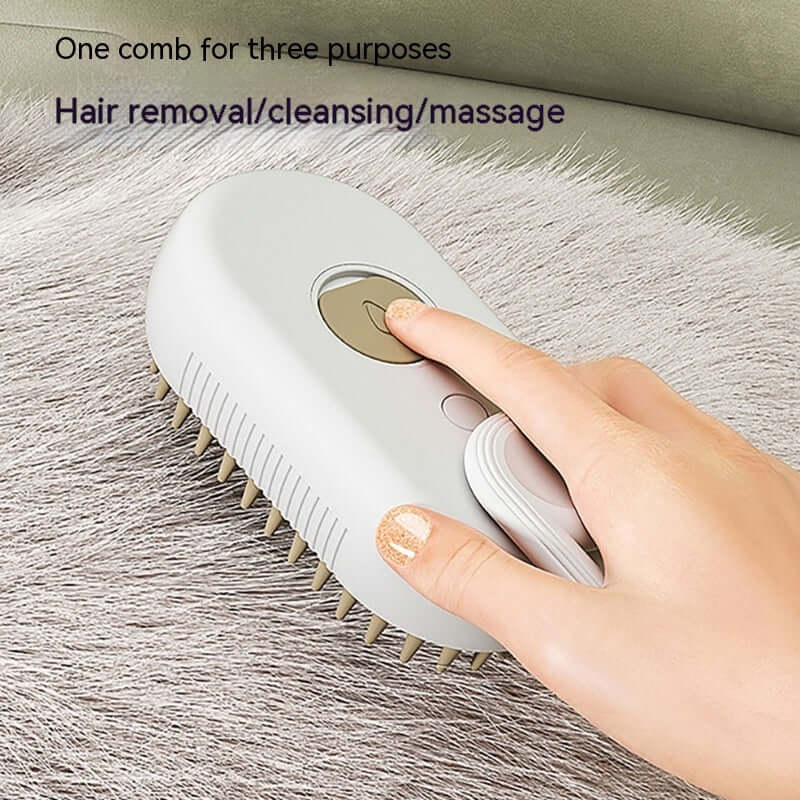 Zenvra electric steam pet grooming brush with hair removal comb showing a close-up of the device and bristles for pet hair removal.