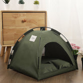 Cat cooling mat for pets inside a cozy green tent structure with a soft cushion for comfort.